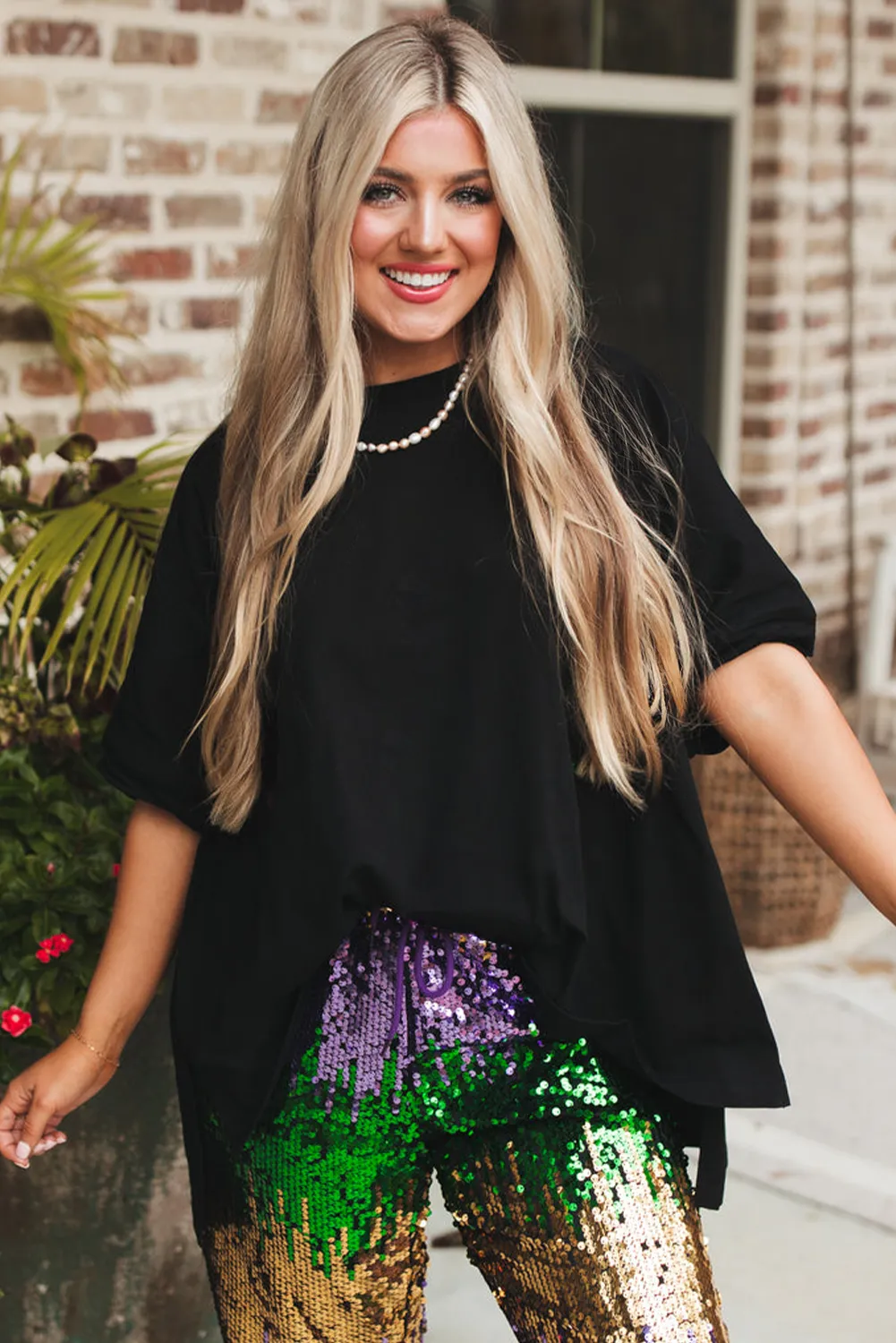 Black Loose Half Sleeve Hi Low Hem T Shirt sold by Beagle Boutique product image thumbnail 3