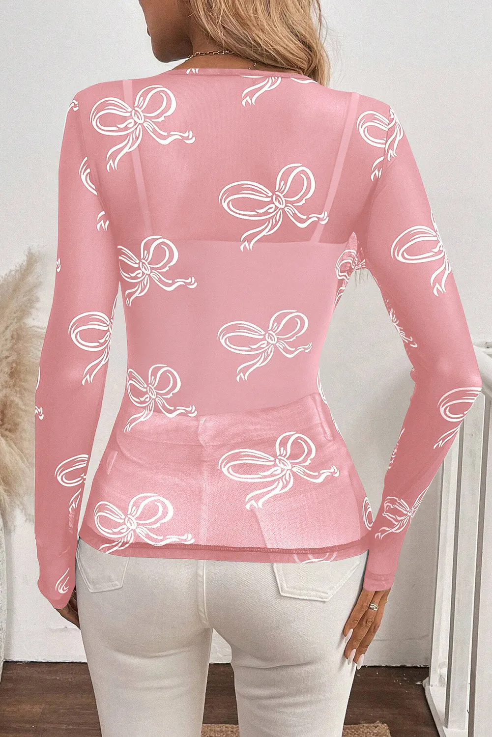 Pink Round Neck Bow Print Long Sleeve Mesh Top sold by Beagle Boutique product image thumbnail 2