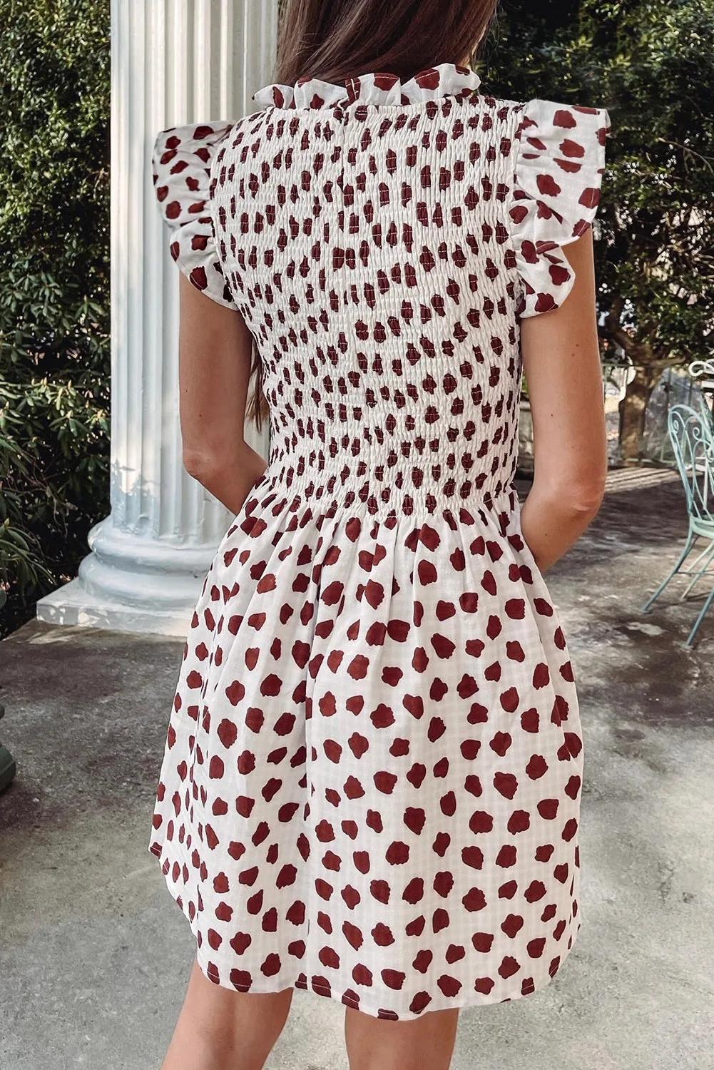 Brown Abstract Printed Flutter Sleeve Smocked Bodice Short Dress sold by Beagle Boutique product image thumbnail 2