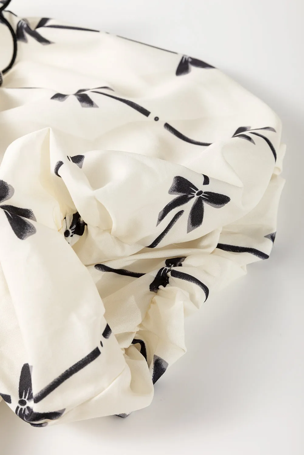 Apricot Bow Printed Ruffled Bubble Sleeve Lace-up Notched Neck Plus Size Blouse sold by Beagle Boutique product image thumbnail 3