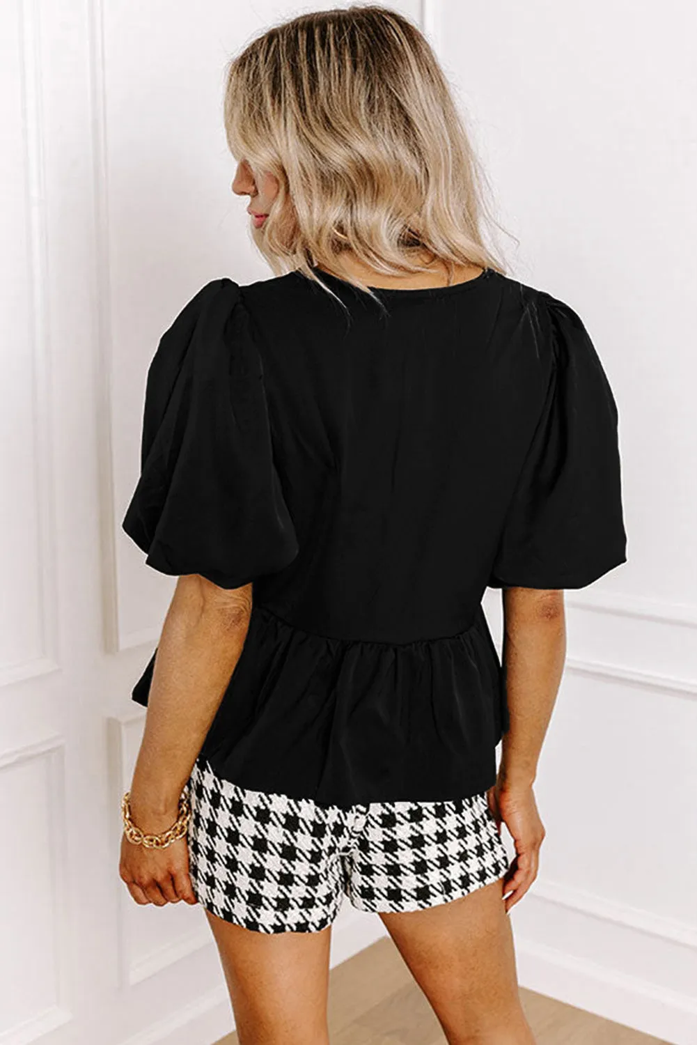 Black Puff Sleeve Bowknot Front Peplum Blouse sold by Beagle Boutique product image thumbnail 2