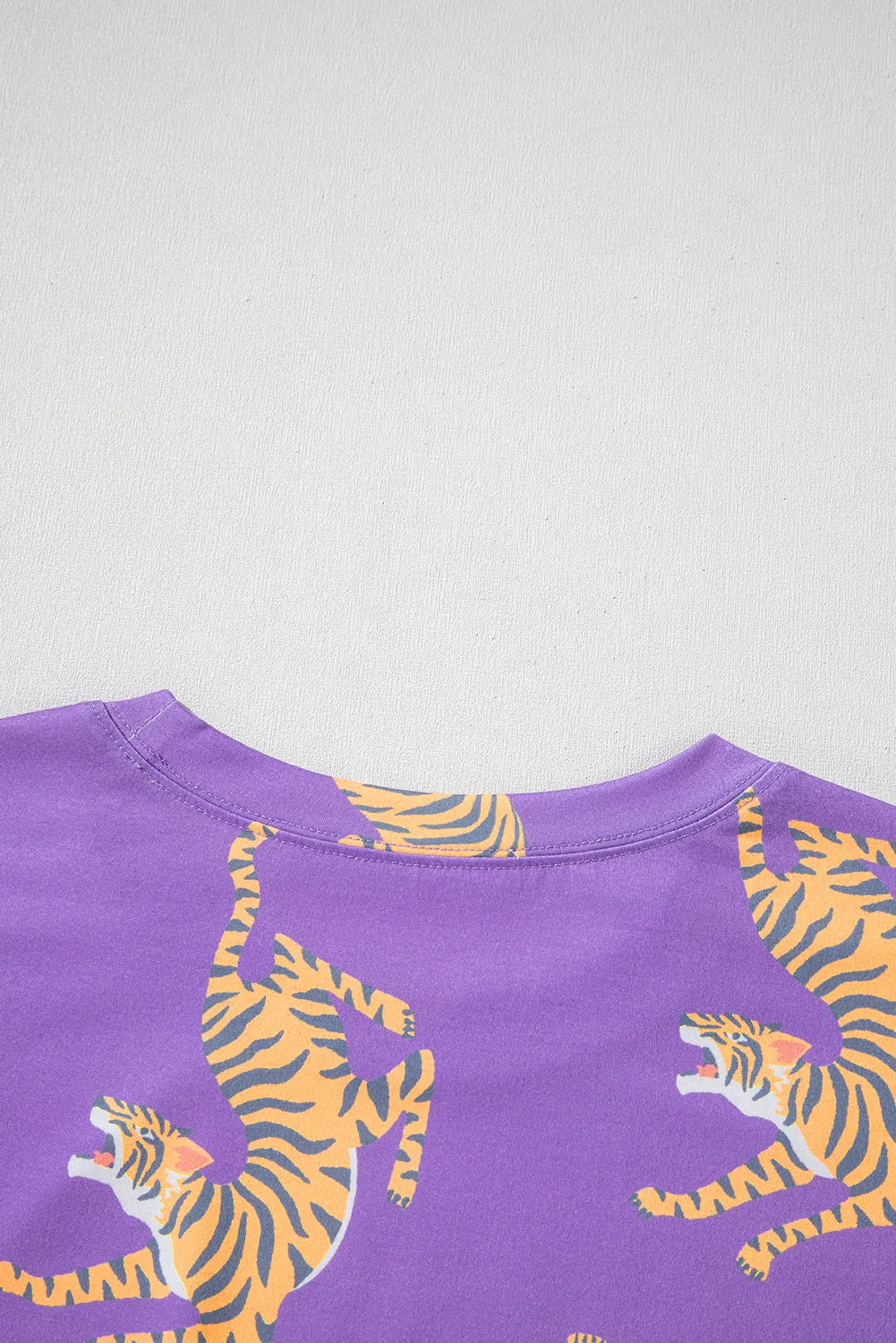 Purple Allover Tiger Printed Patch Pocket Loose T Shirt sold by Beagle Boutique product image thumbnail 4