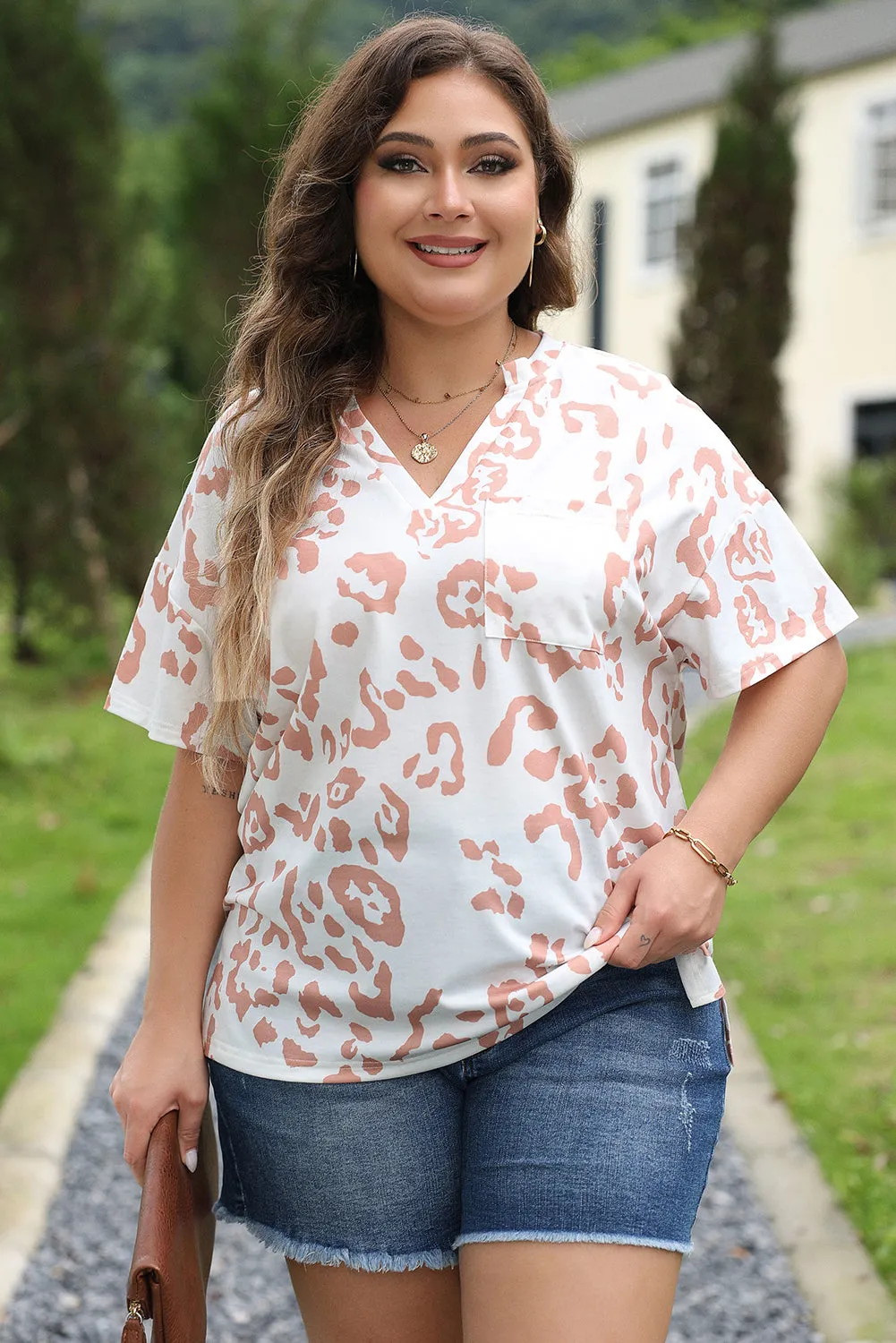 White Plus Size Leopard Print V Neck Short Sleeve Top sold by Beagle Boutique