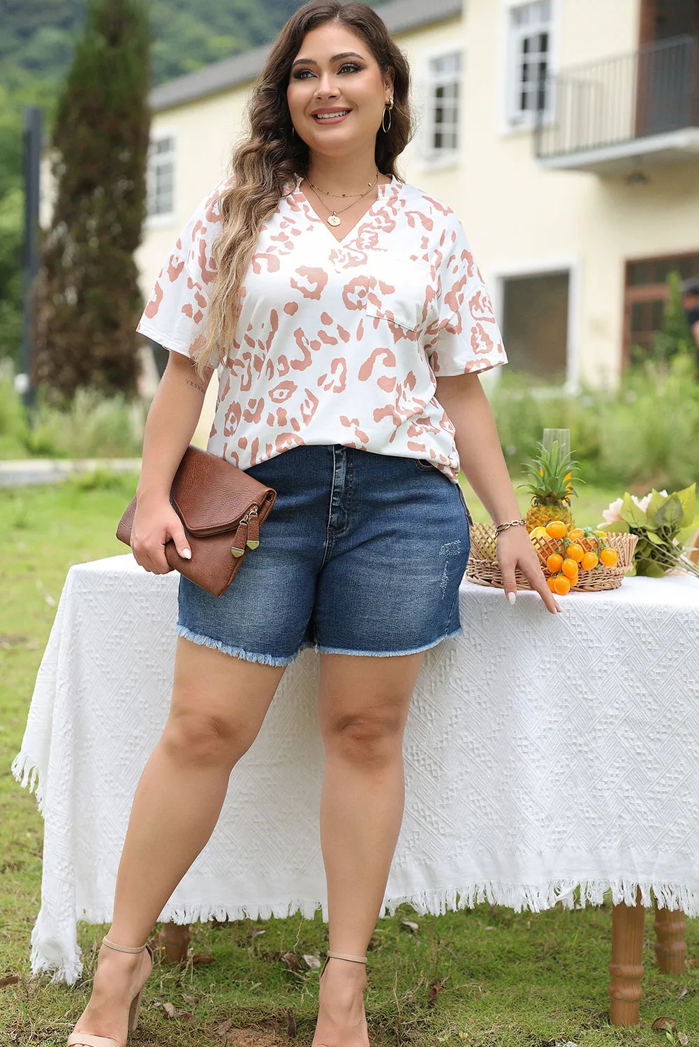 White Plus Size Leopard Print V Neck Short Sleeve Top sold by Beagle Boutique product image thumbnail 5