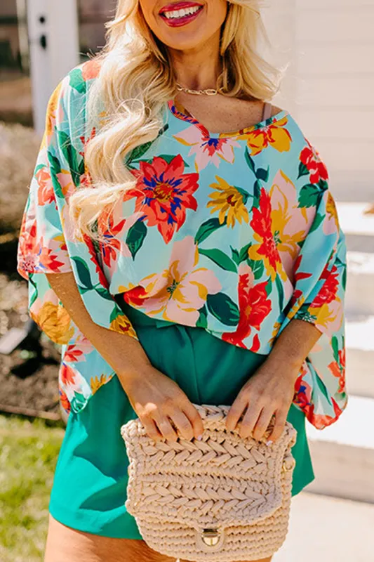 Sky Blue Plus Size Floral Print V Neck Batwing Sleeve Blouse sold by Beagle Boutique