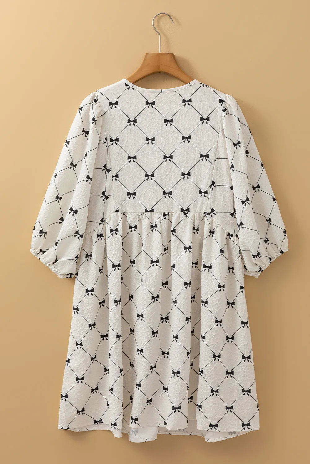 White Bowtie Pattern Textured Puff Half Sleeve Loose Mini Dress sold by Beagle Boutique product image thumbnail 4