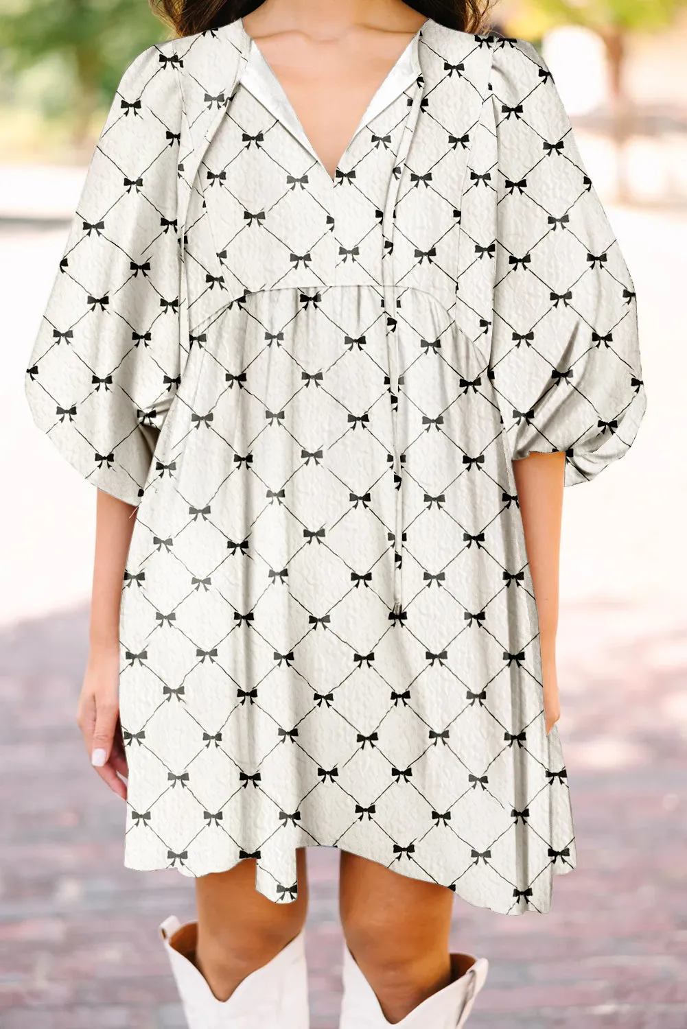 White Bowtie Pattern Textured Puff Half Sleeve Loose Mini Dress sold by Beagle Boutique