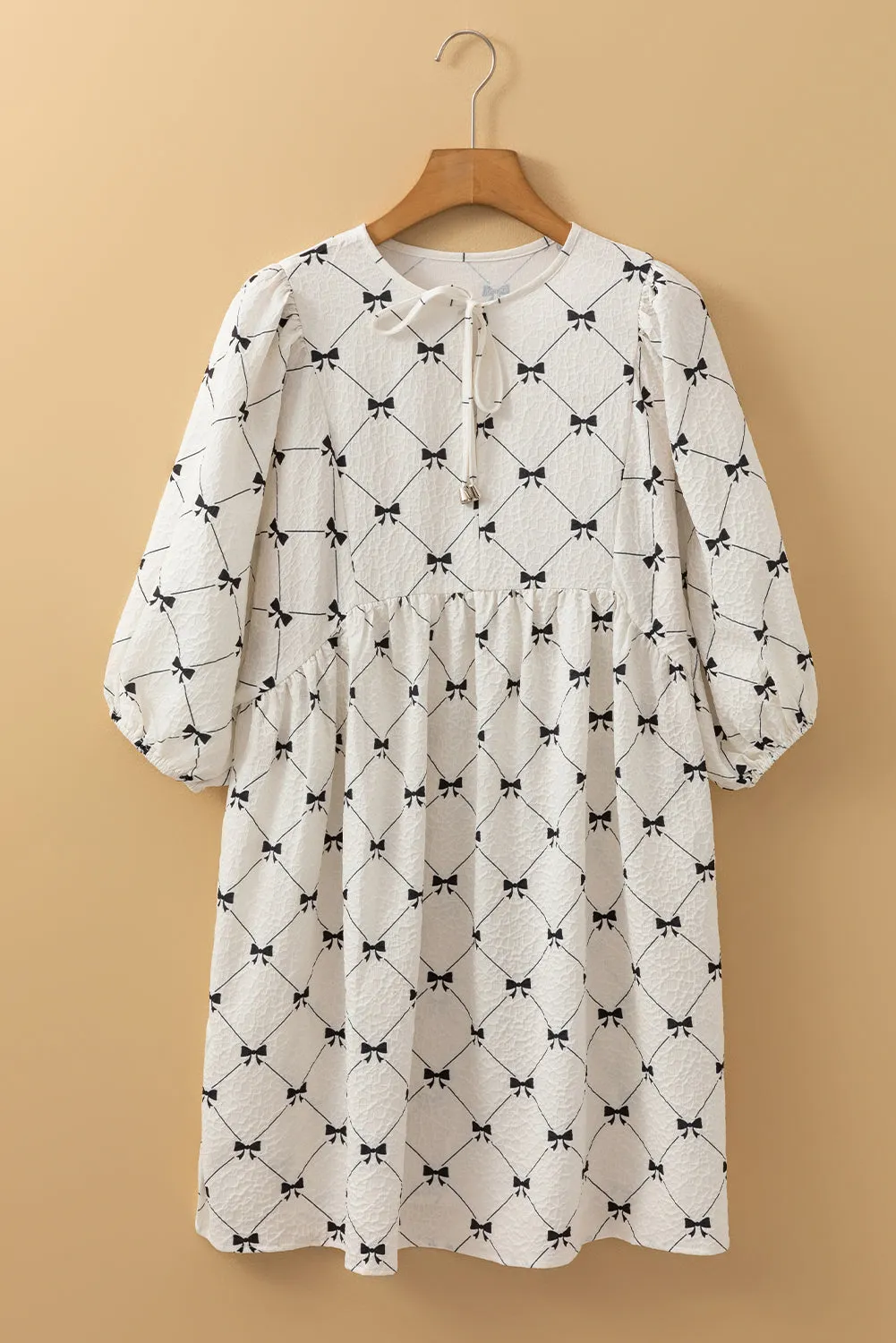 White Bowtie Pattern Textured Puff Half Sleeve Loose Mini Dress sold by Beagle Boutique product image thumbnail 3