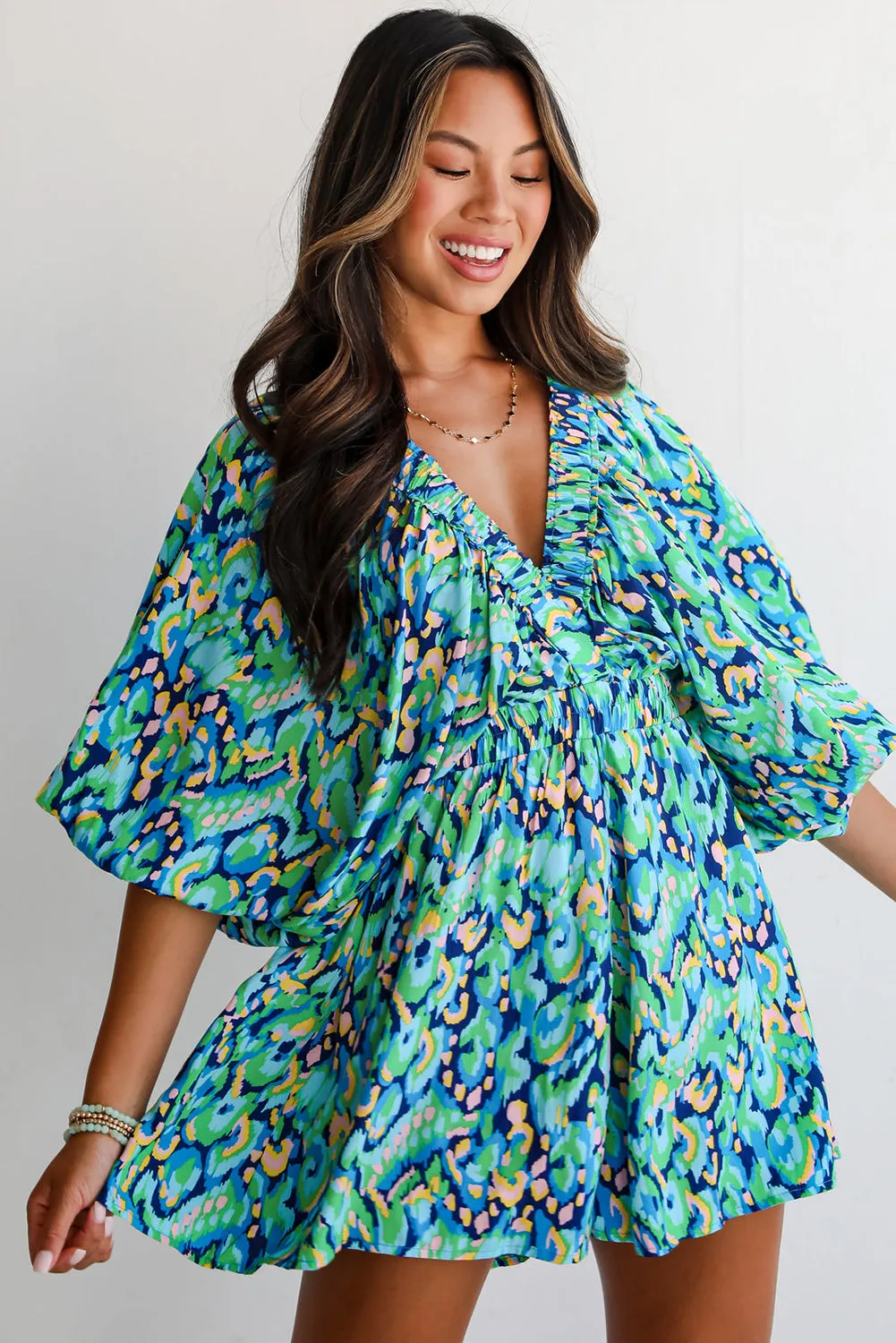 Green Abstract Print Puff Sleeve V Neck High Waist Romper sold by Beagle Boutique product image thumbnail 3