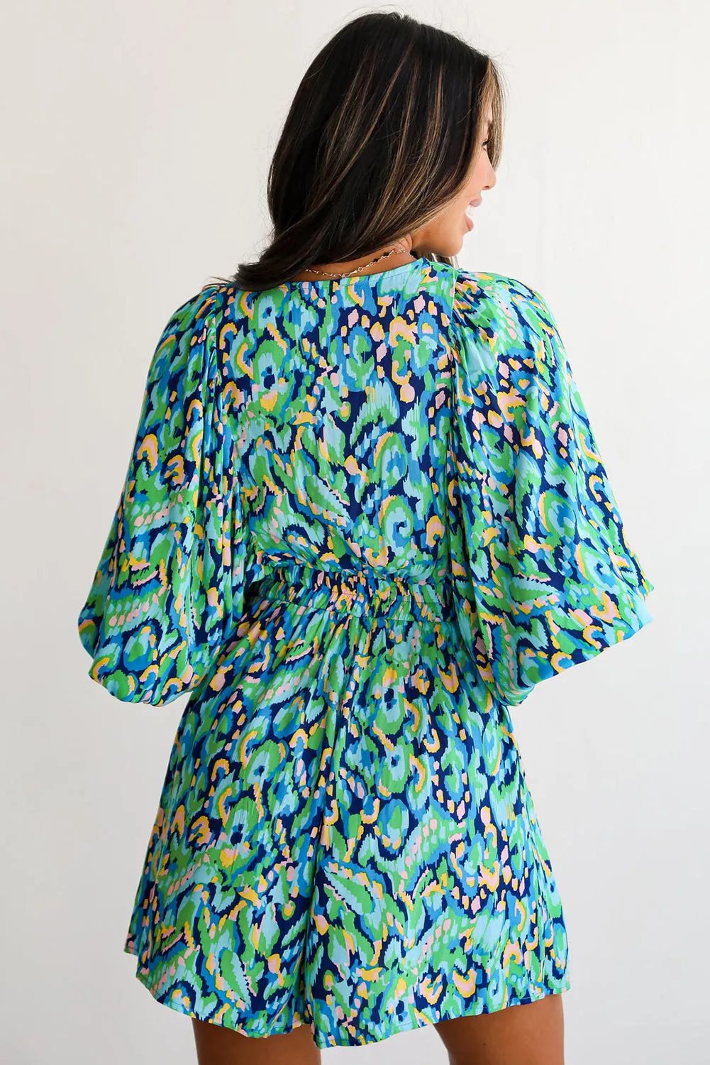 Green Abstract Print Puff Sleeve V Neck High Waist Romper sold by Beagle Boutique product image thumbnail 2