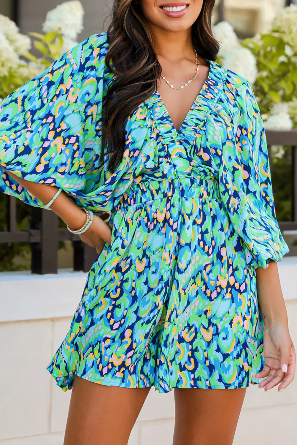 Green Abstract Print Puff Sleeve V Neck High Waist Romper sold by Beagle Boutique
