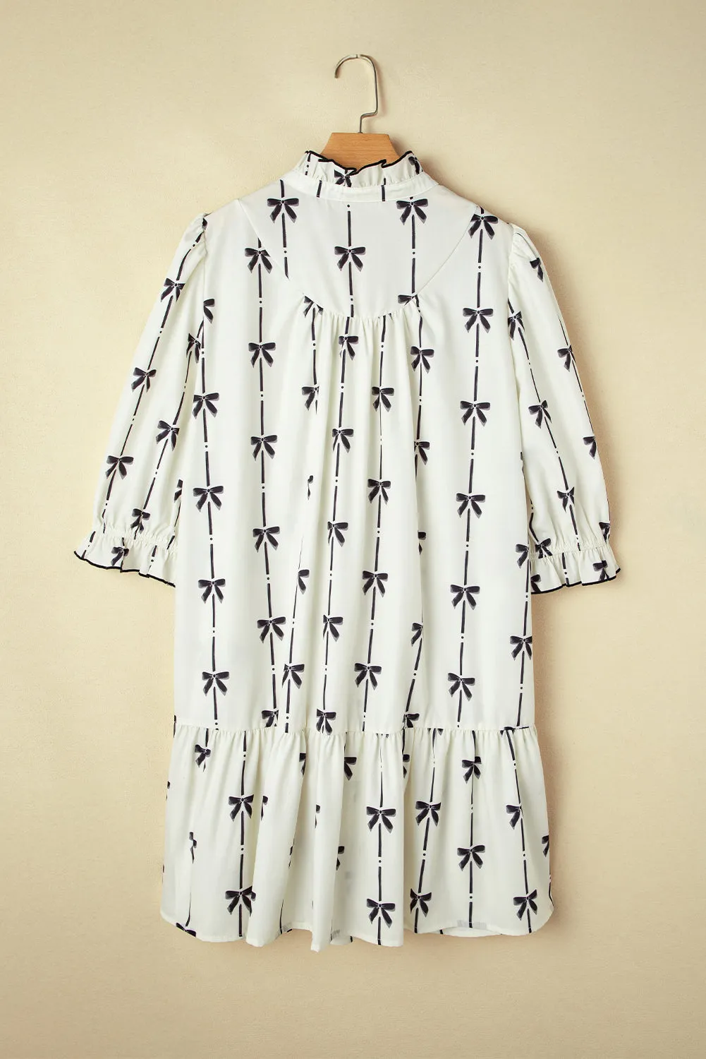 Apricot Bow Printed Puff Sleeve Ruffled Plus Size Mini Dress sold by Beagle Boutique product image thumbnail 2