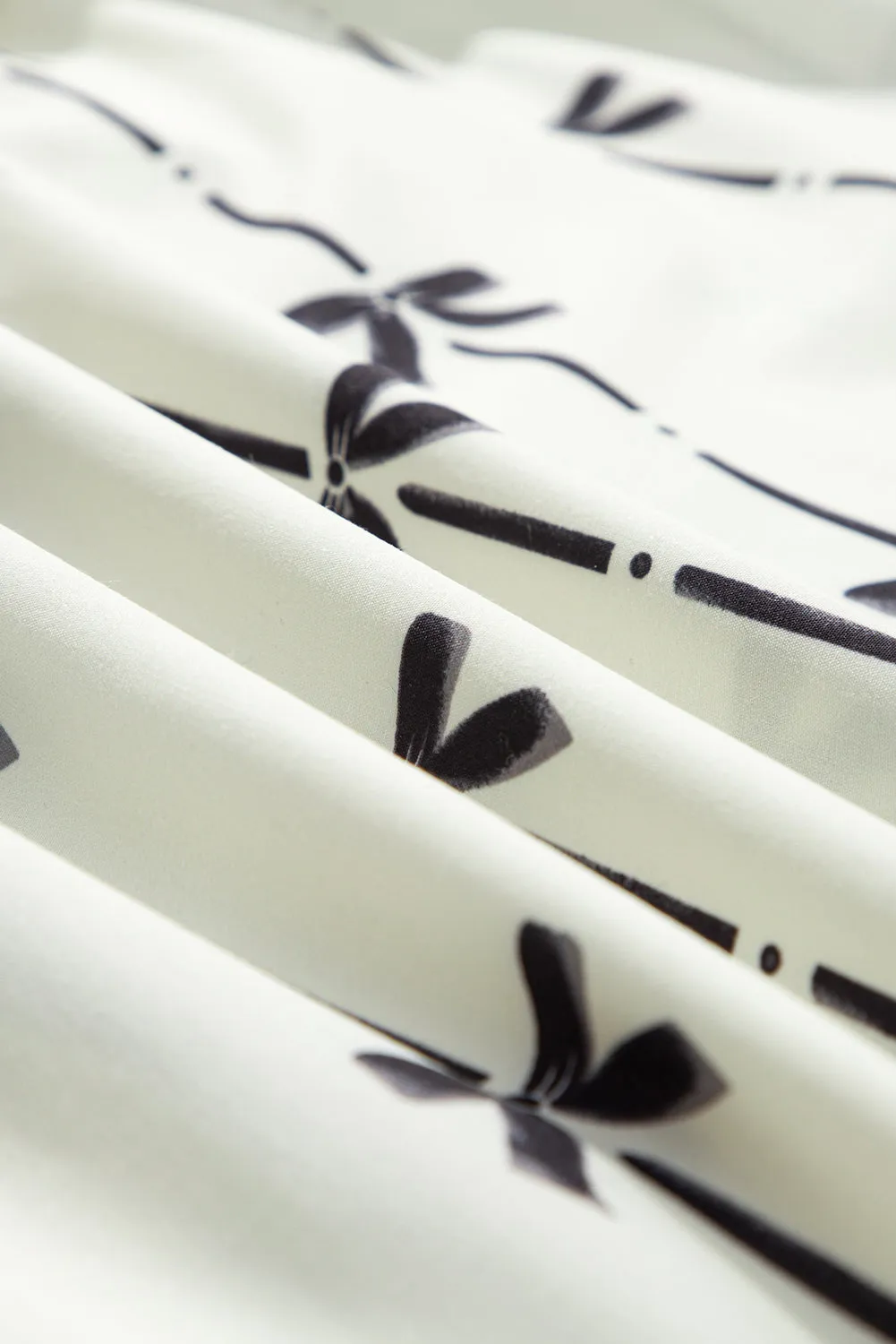 Apricot Bow Printed Puff Sleeve Ruffled Plus Size Mini Dress sold by Beagle Boutique product image thumbnail 3