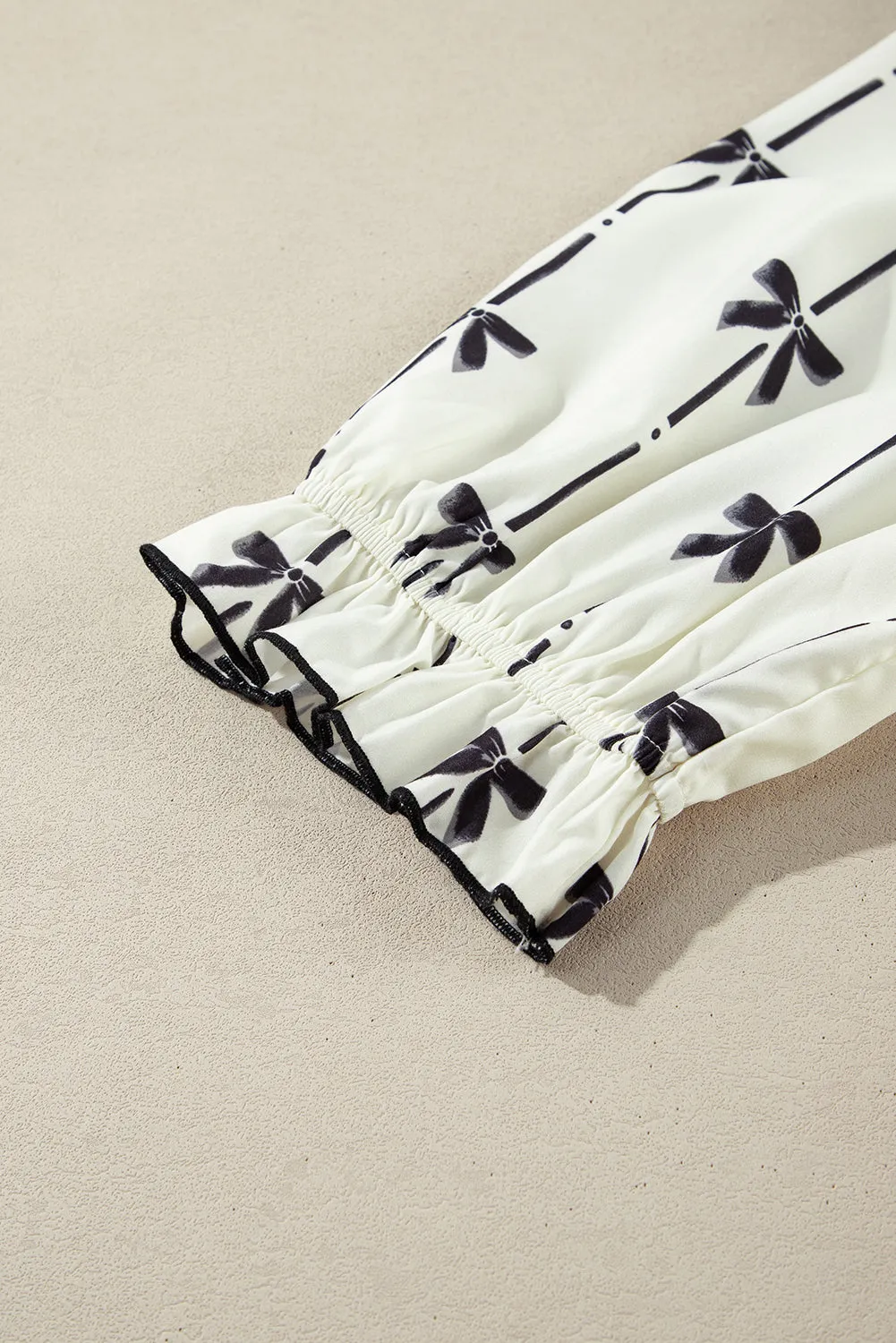 Apricot Bow Printed Puff Sleeve Ruffled Plus Size Mini Dress sold by Beagle Boutique product image thumbnail 5