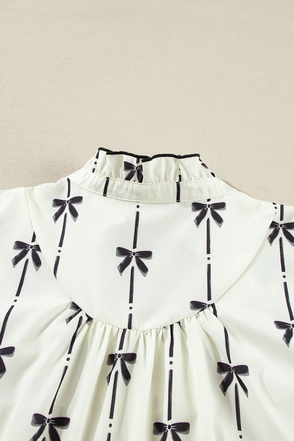 Apricot Bow Printed Puff Sleeve Ruffled Plus Size Mini Dress sold by Beagle Boutique product image thumbnail 4