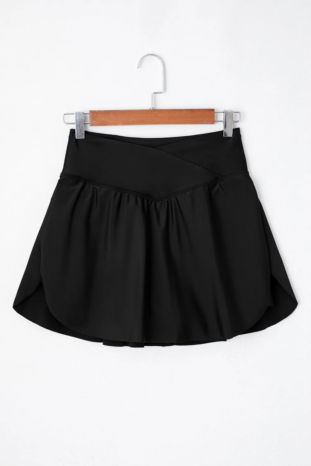 Black Solid Pocketed Crossover High Waist Swim Skort sold by Beagle Boutique product image thumbnail 4