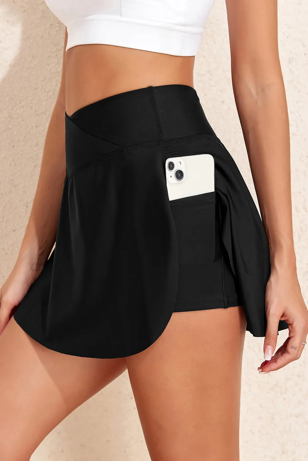 Black Solid Pocketed Crossover High Waist Swim Skort sold by Beagle Boutique product image thumbnail 2