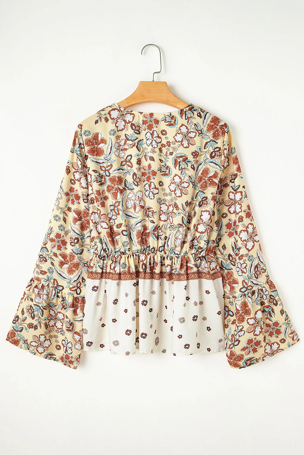 Yellow Printed Floral Bell Sleeve V Neck Wrapped Contrast Peplum Blouse sold by Beagle Boutique product image thumbnail 2