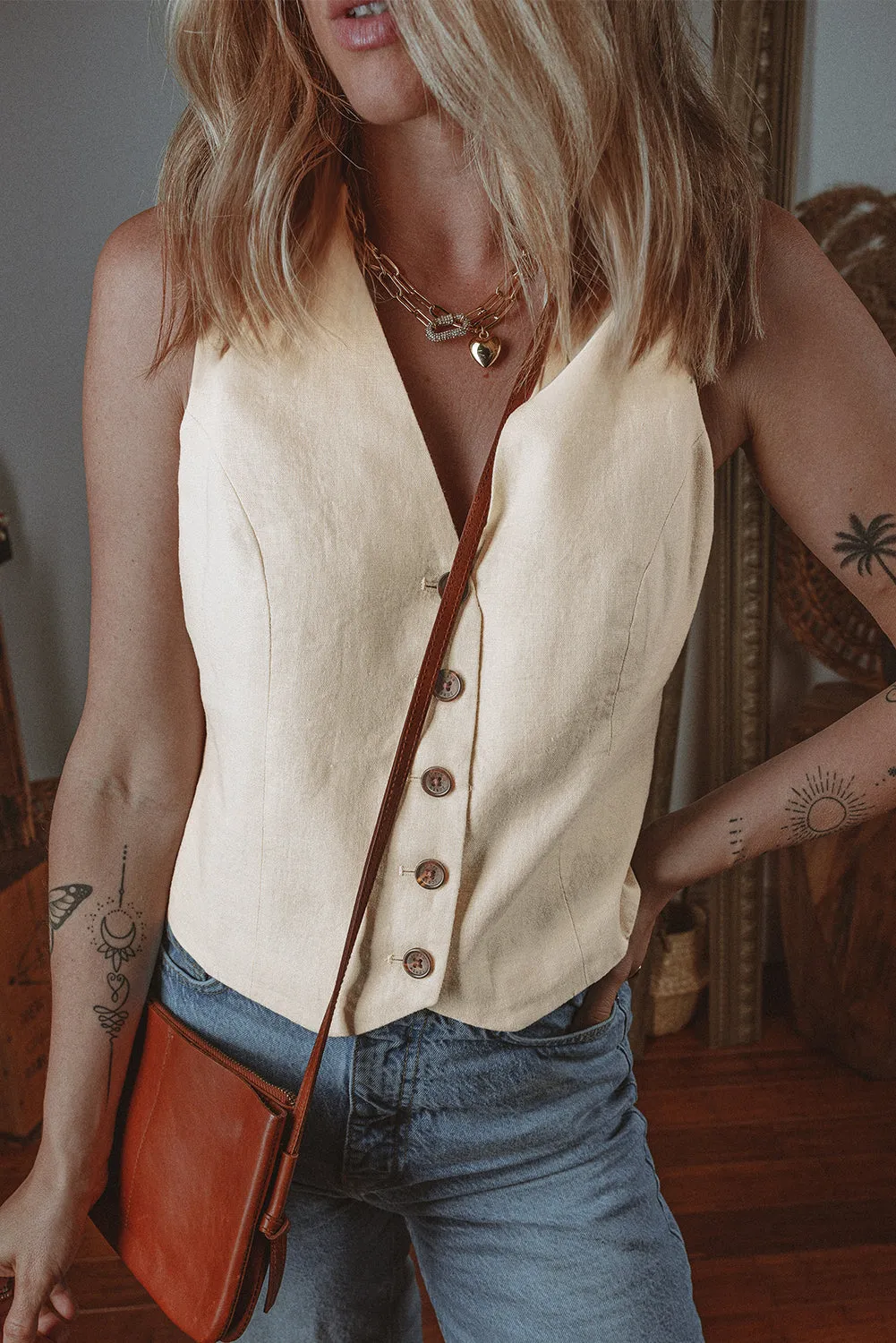 White Slim Fit Buttoned V Neck Vest sold by Beagle Boutique