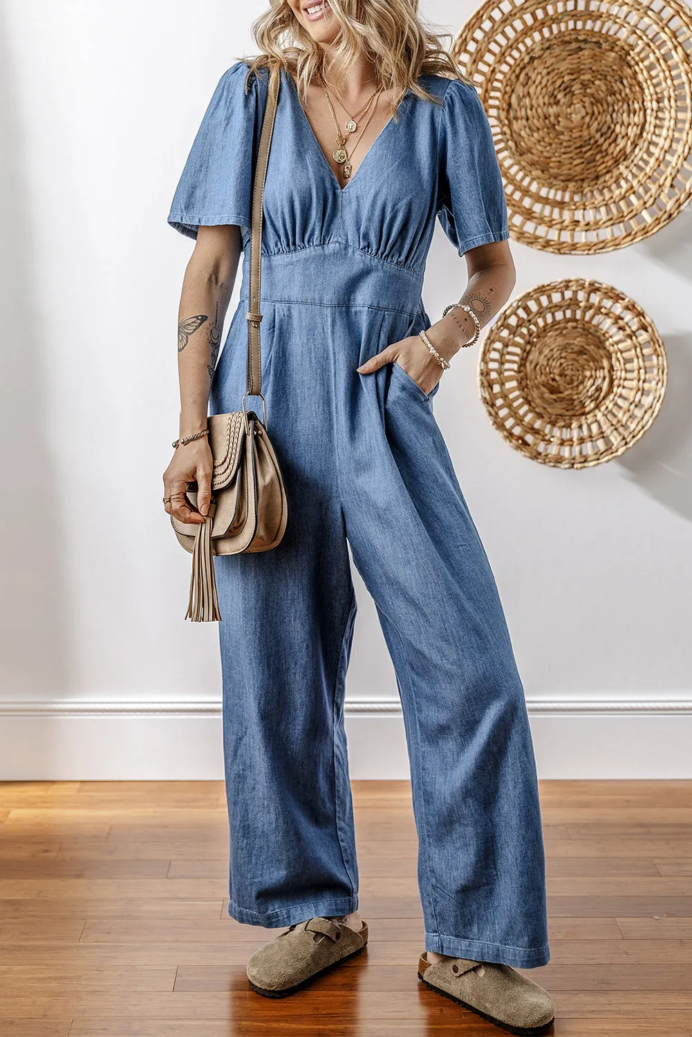 Ashleigh Blue V Neck Short Sleeve Smocked Back Denim Loose Jumpsuit sold by Beagle Boutique