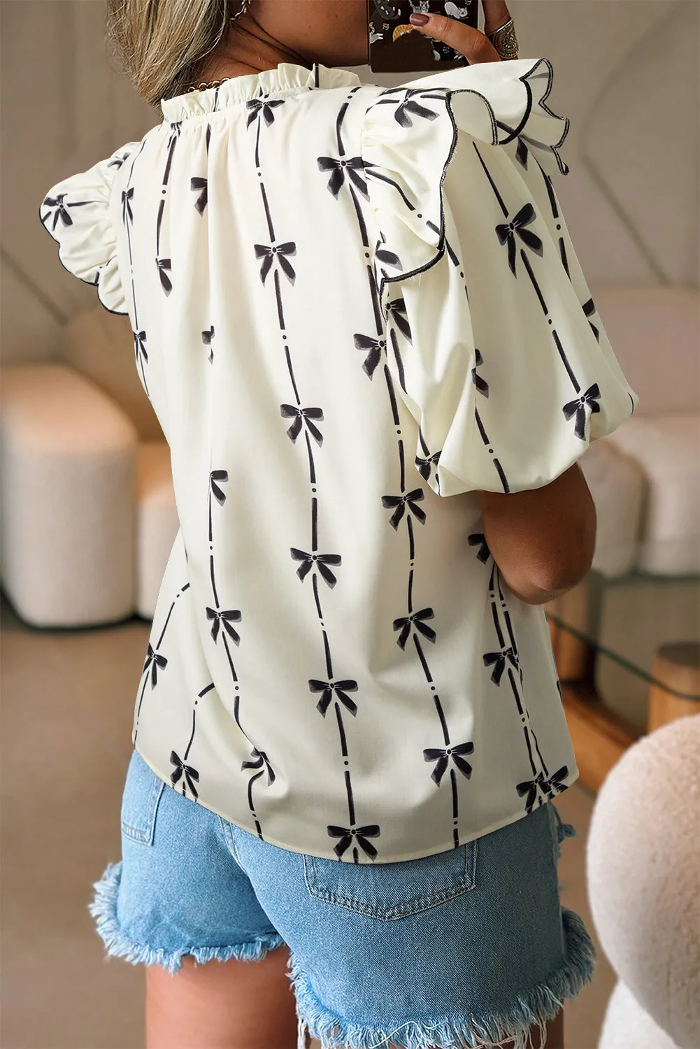 Beige Bow Printed Ruffled Bubble Sleeve Tied Notched V Neck Blouse sold by Beagle Boutique product image thumbnail 4