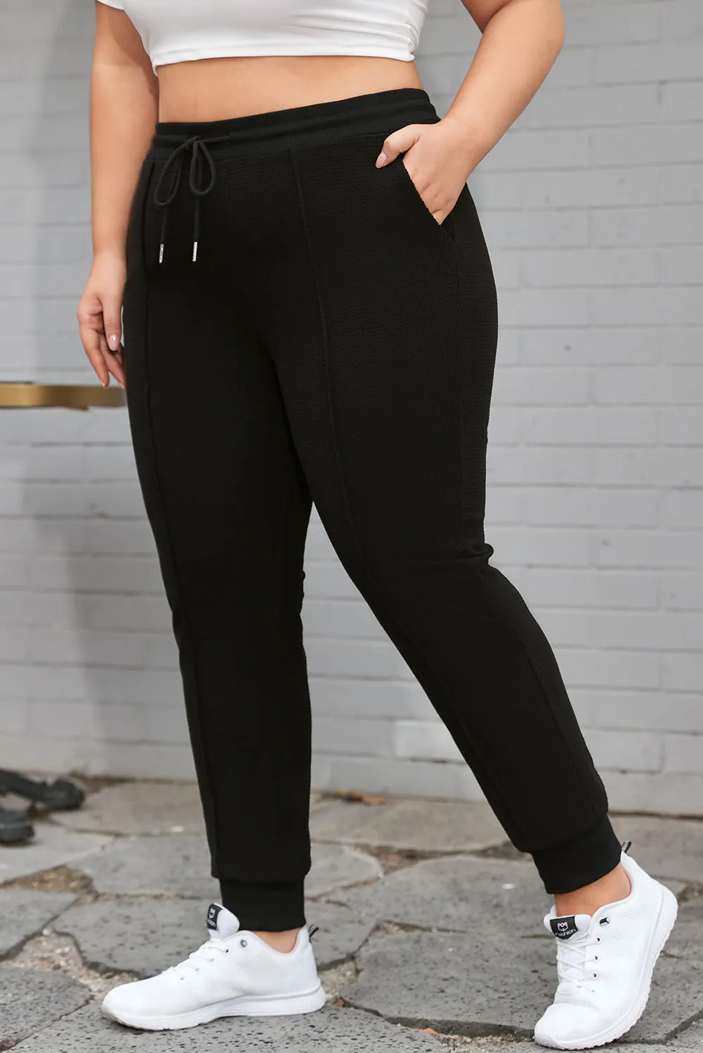 Black Plus Size Textured Exposed Seam Drawstring Jogger Pants sold by Beagle Boutique product image thumbnail 3