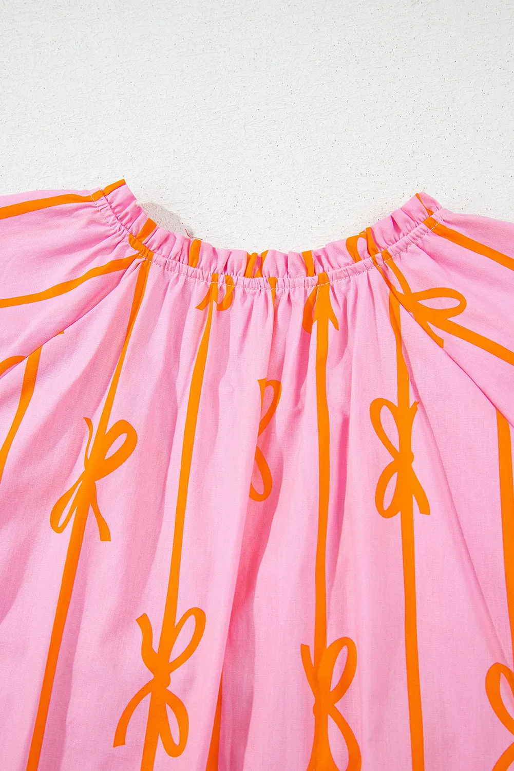 Rose Bowknot Print Shirred V Neck Puff Sleeve Plus Size Blouse sold by Beagle Boutique product image thumbnail 4