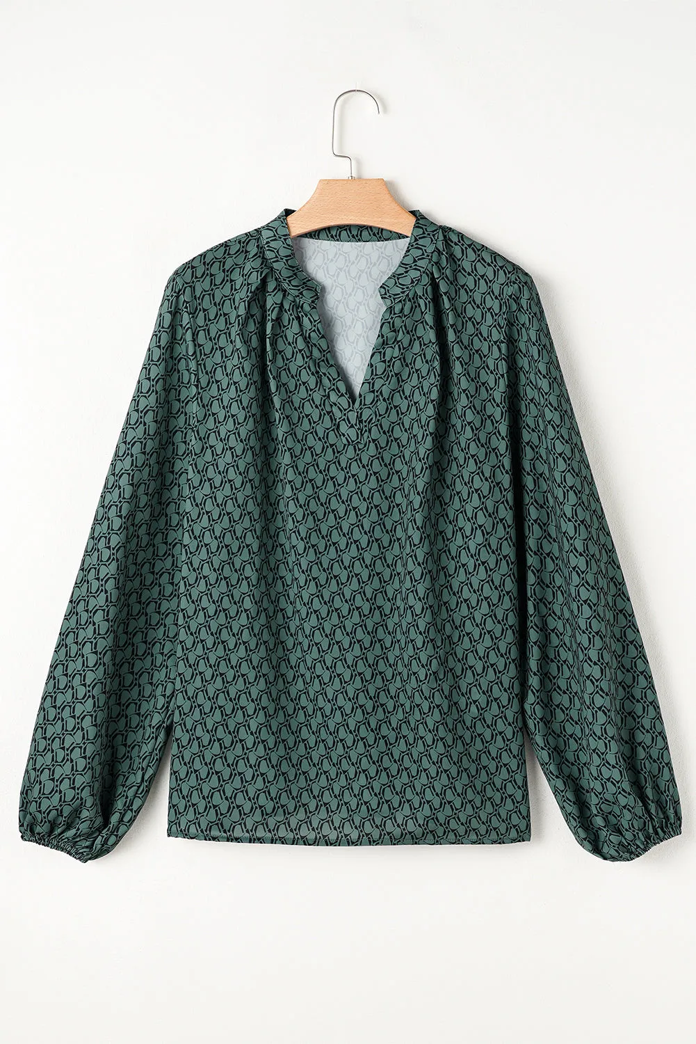 Green Geometric Print Notched Neck Puff Sleeve Blouse sold by Beagle Boutique product image thumbnail 4