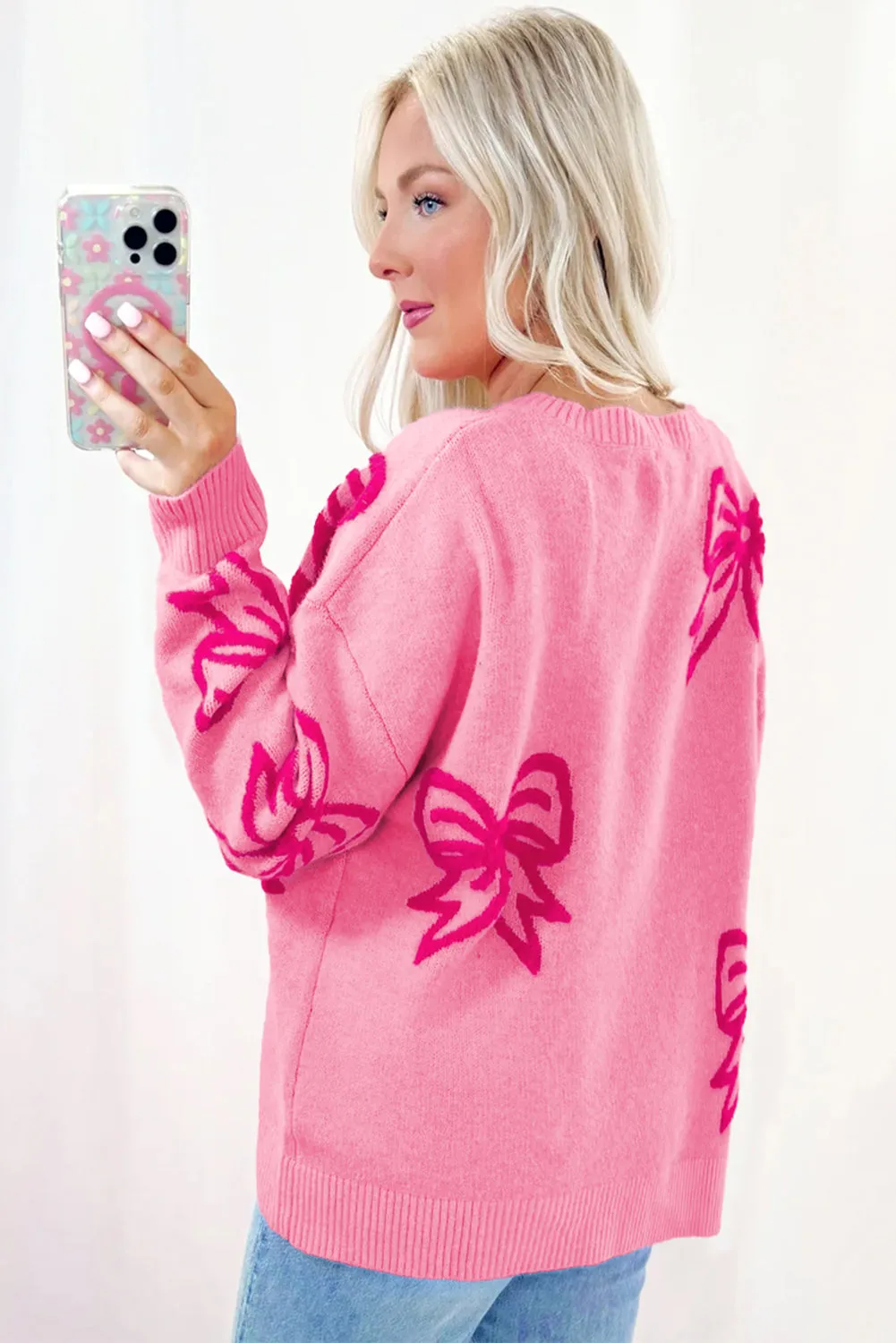 Pink Bow Pattern Drop Shoulder Loose Sweater sold by Beagle Boutique product image thumbnail 2