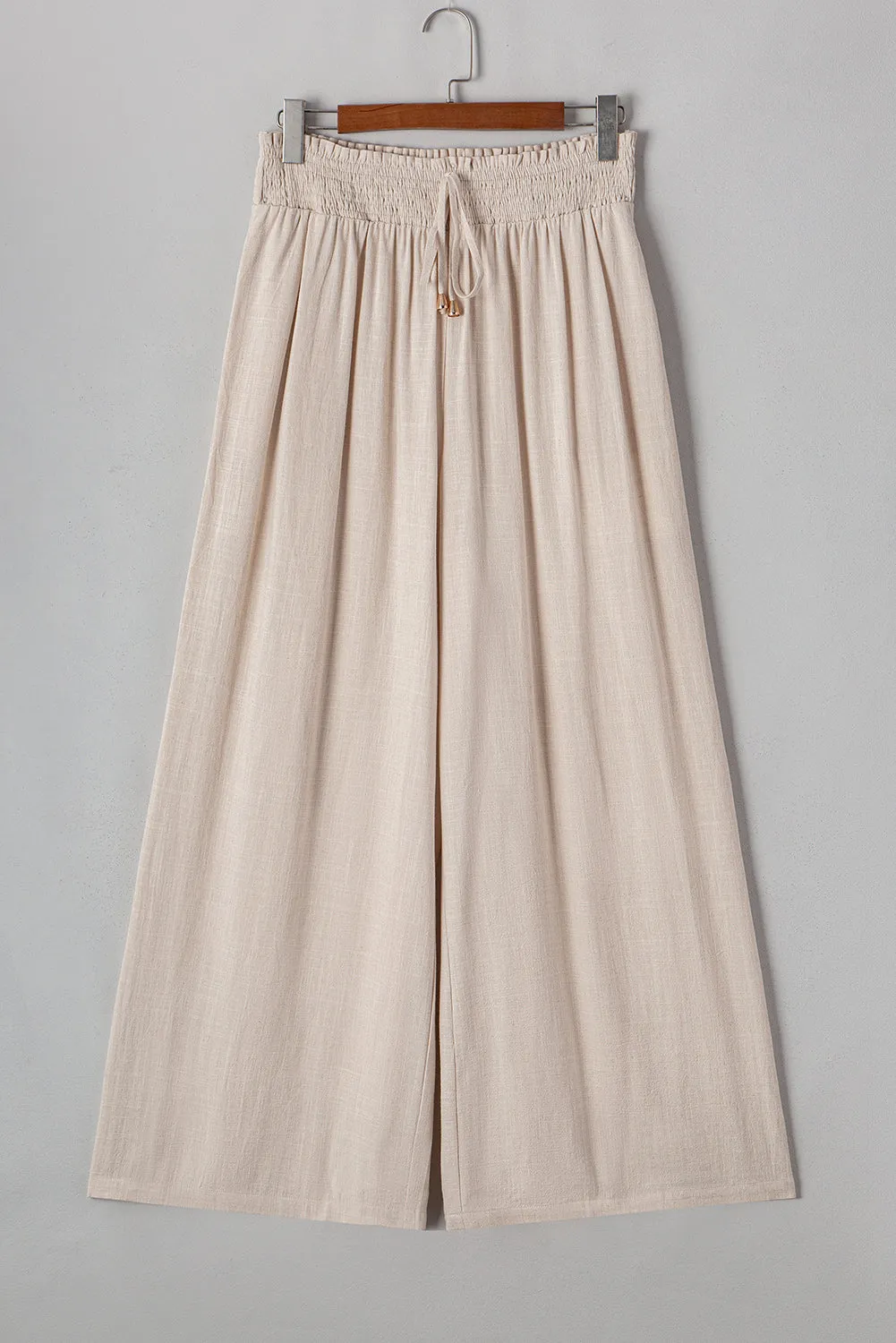 Beige Smocked High Waist Wide Leg Plus Size Trousers sold by Beagle Boutique
