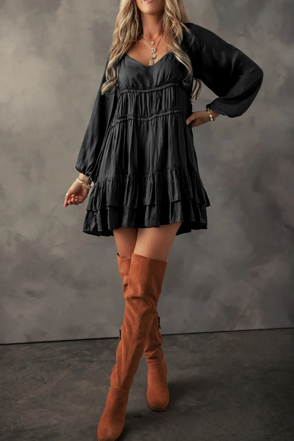 Black Tiered Ruffled Puff Sleeve Loose Fit Mini Dress sold by Beagle Boutique product image thumbnail 3