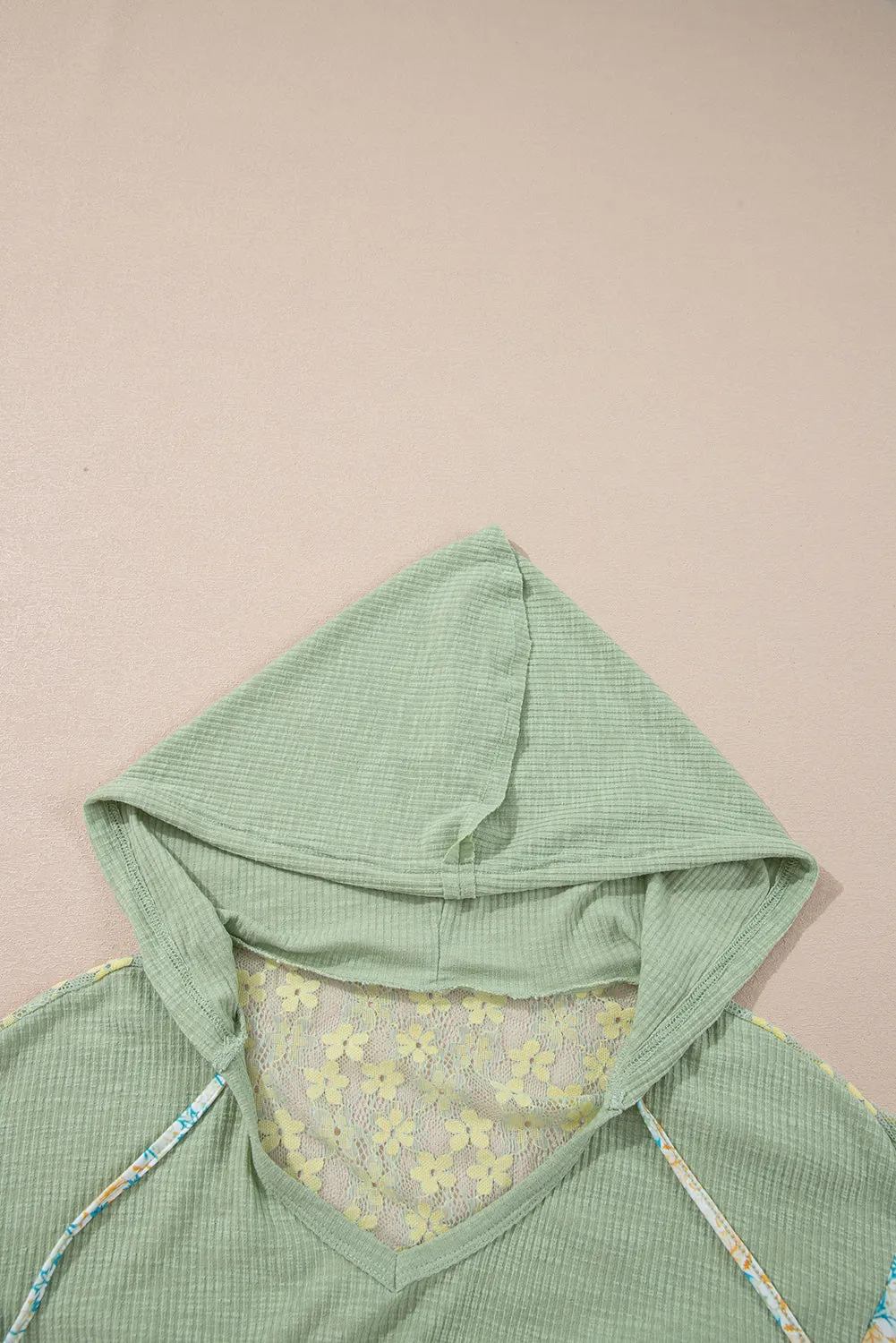 Clearly Aqua Oversized Floral Peace Sign Graphic Patchwork Knit Hooded Top sold by Beagle Boutique product image thumbnail 3