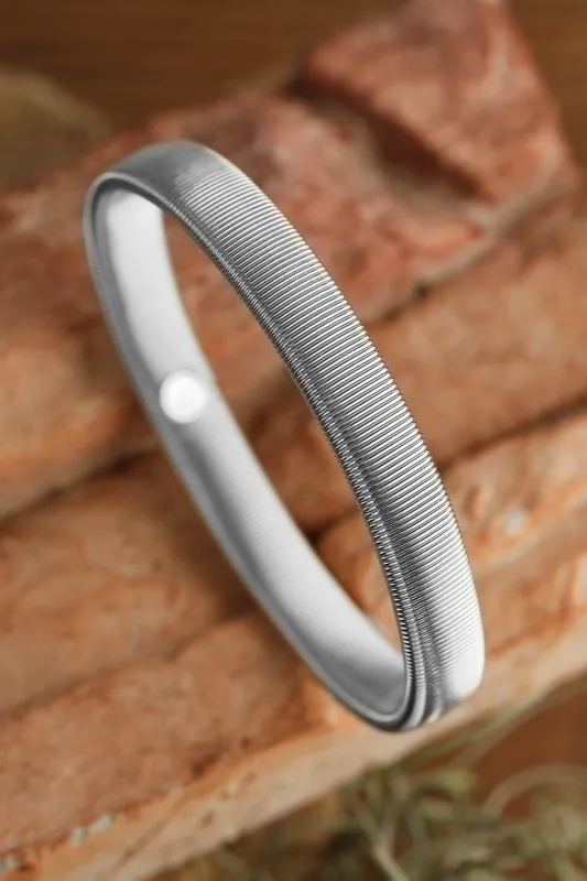 Silvery Stretchy Plated Metal Wide Bangle sold by Beagle Boutique