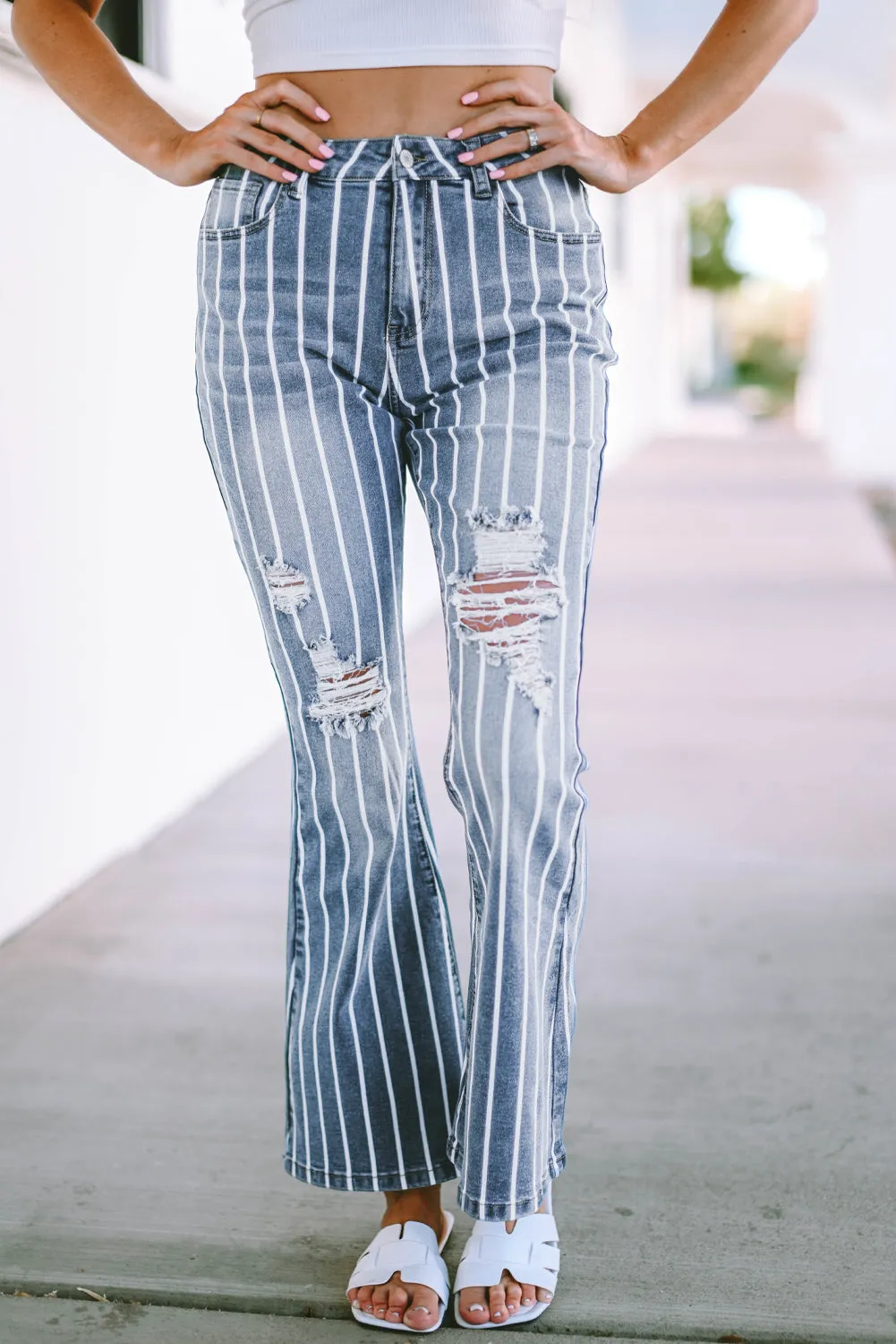 Sky Blue Vertical Striped Ripped Flare Jeans sold by Beagle Boutique