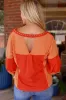 Fiery Red Studded V Neckline Exposed Seam Textured Knit Top sold by Beagle Boutique