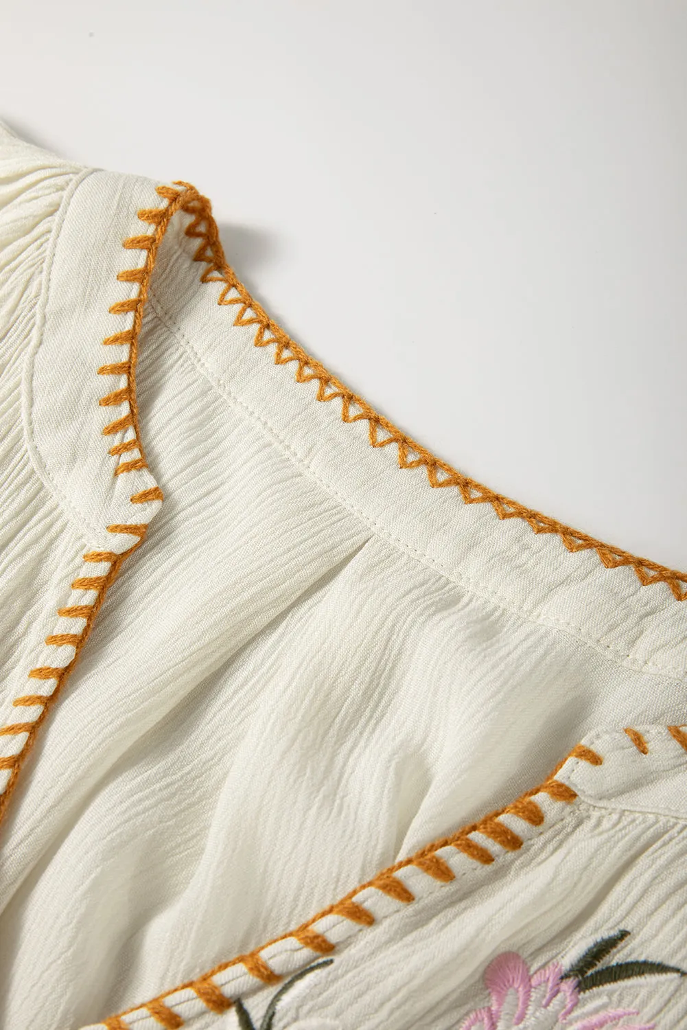 Beige Floral Embroidered Textured Puff Sleeve Loose Shirt sold by Beagle Boutique product image thumbnail 4