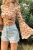 Orange Floral Printed Bell Sleeve Mock Neck Scallop Trim Blouse sold by Beagle Boutique