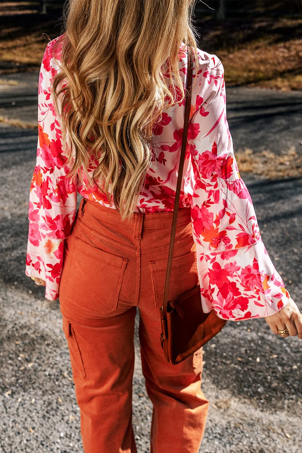 Pink Floral Print Tiered Bell Long Sleeve Buttoned Bodysuit sold by Beagle Boutique product image thumbnail 2