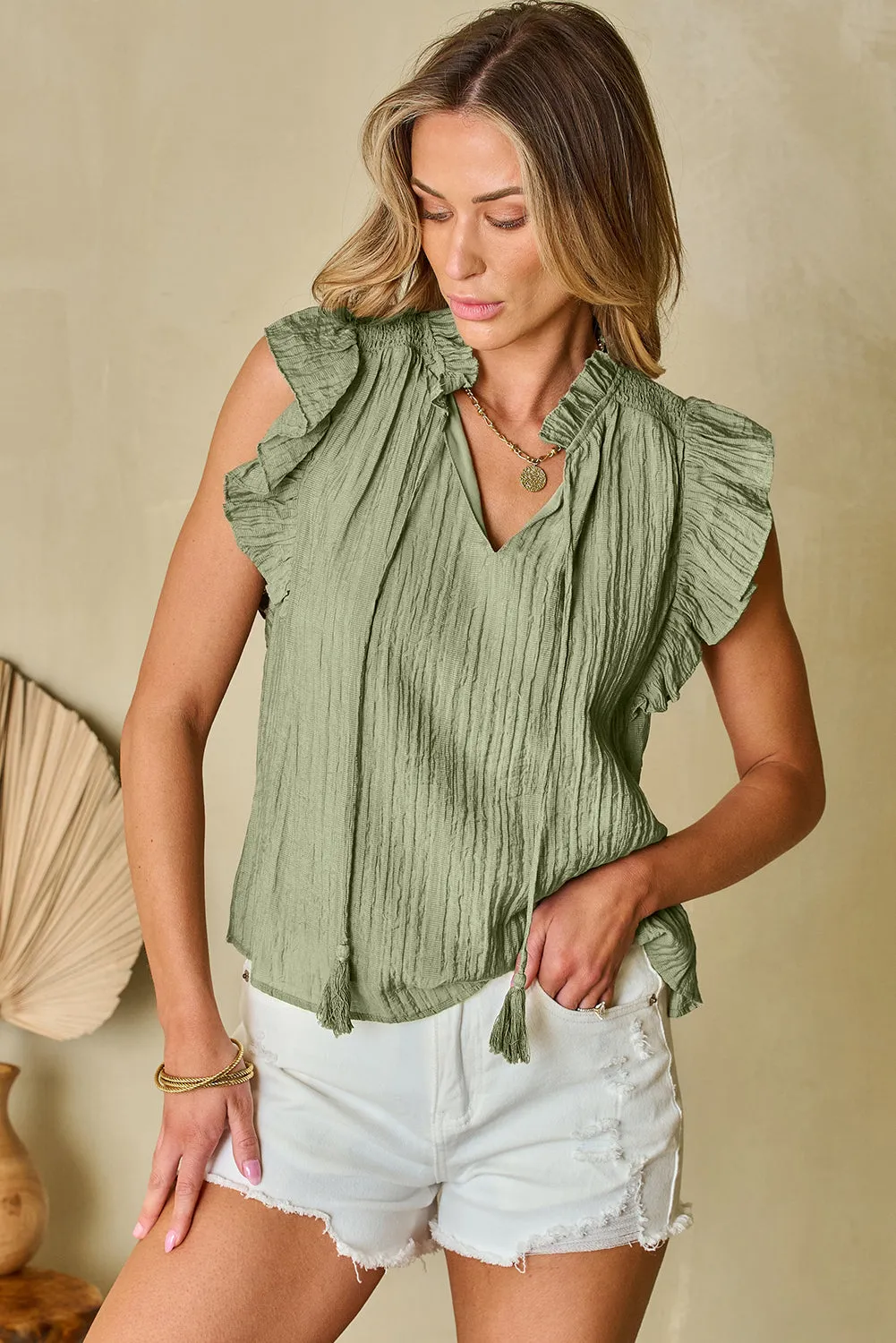 Meadow Mist Green V Neck Flutter Sleeve Textured Blouse sold by Beagle Boutique product image thumbnail 3