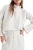 Snow White Ribbed High Neck Drop Shoulder Loose Top sold by Beagle Boutique