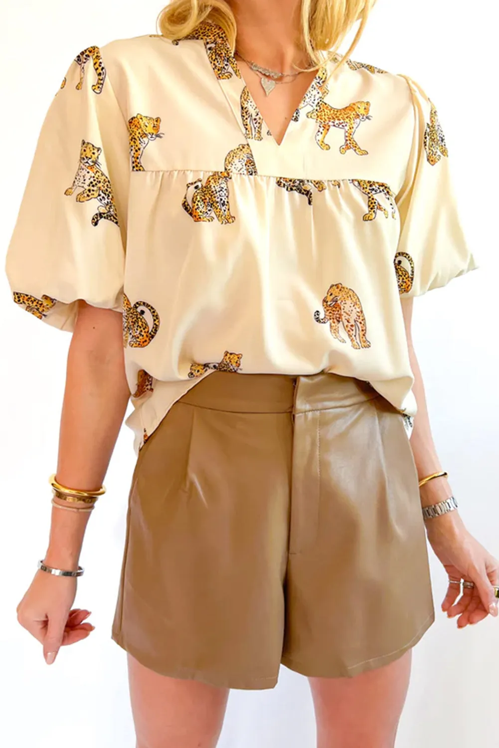 Apricot Cheetah Printed Split Neck Puff Sleeve Blouse sold by Beagle Boutique
