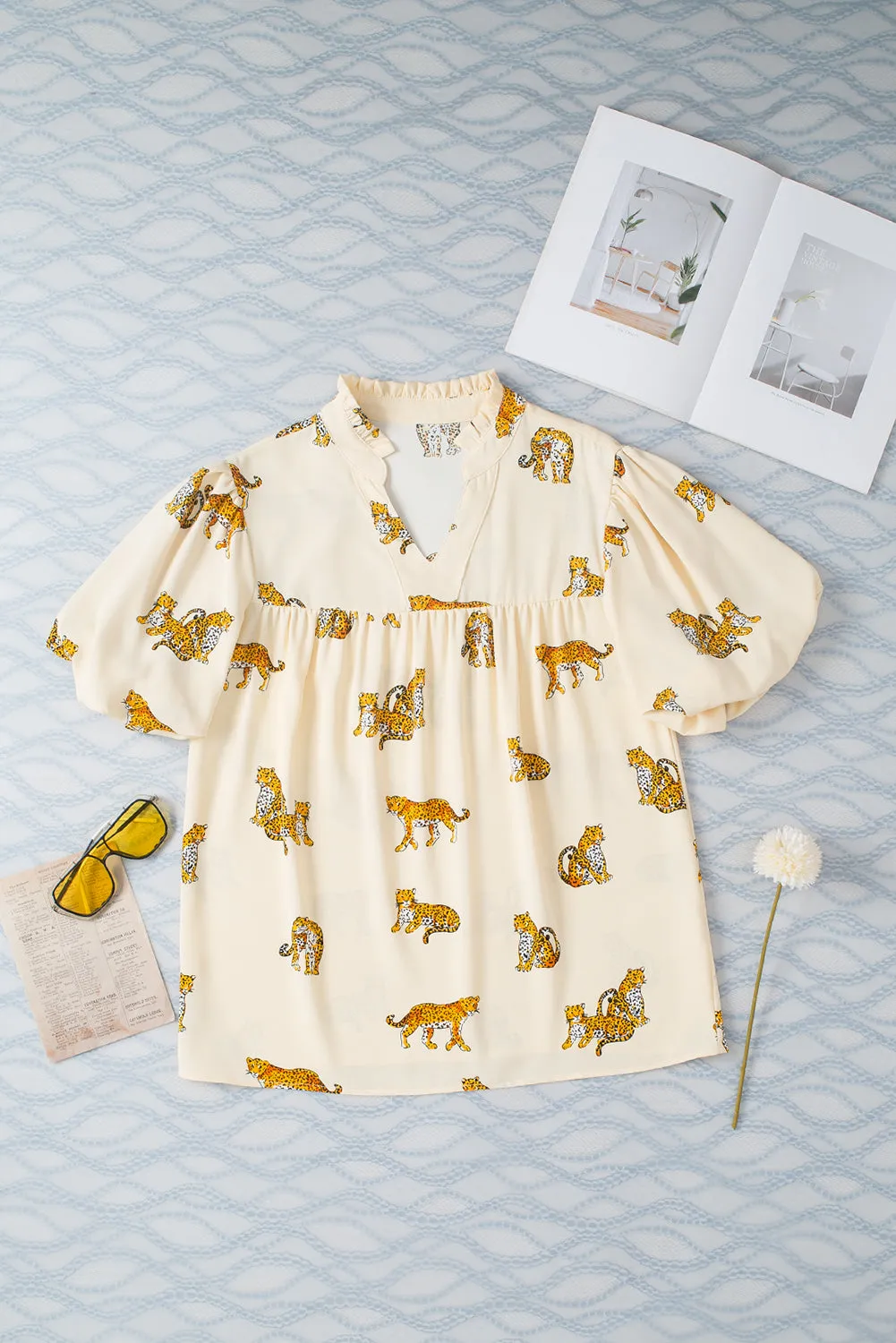 Apricot Cheetah Printed Split Neck Puff Sleeve Blouse sold by Beagle Boutique product image thumbnail 3