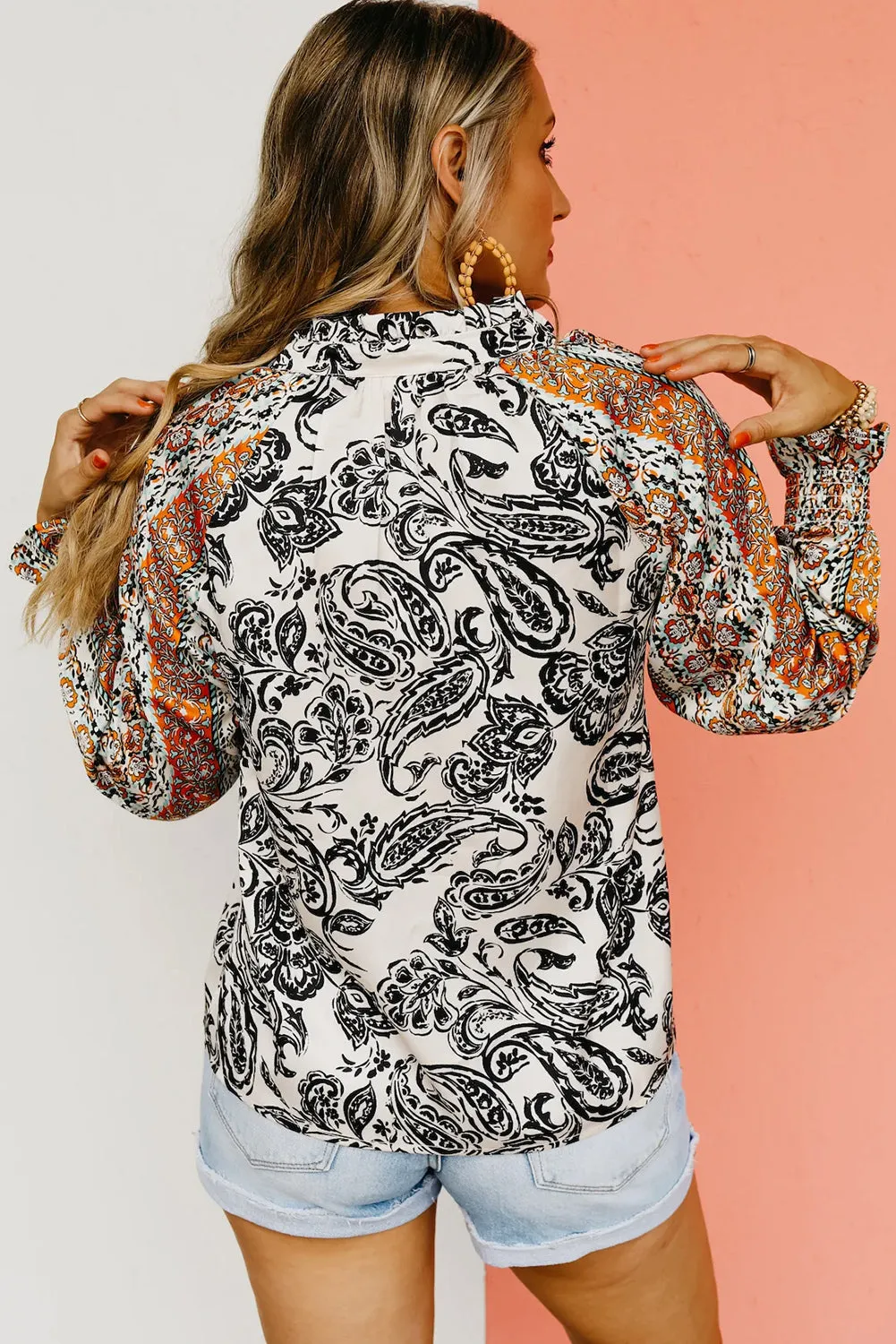 Bright White Abstract Print Flounce Sleeve Tasseled V Neck Blouse sold by Beagle Boutique product image thumbnail 2
