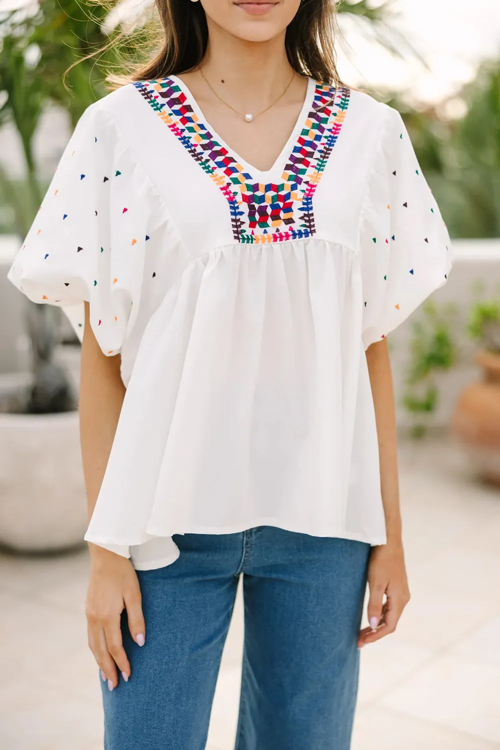 White Embroidered Puff Sleeve V Neck Blouse sold by Beagle Boutique