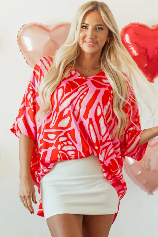 Red Abstract Print V Neck Batwing Sleeve Oversized Blouse sold by Beagle Boutique