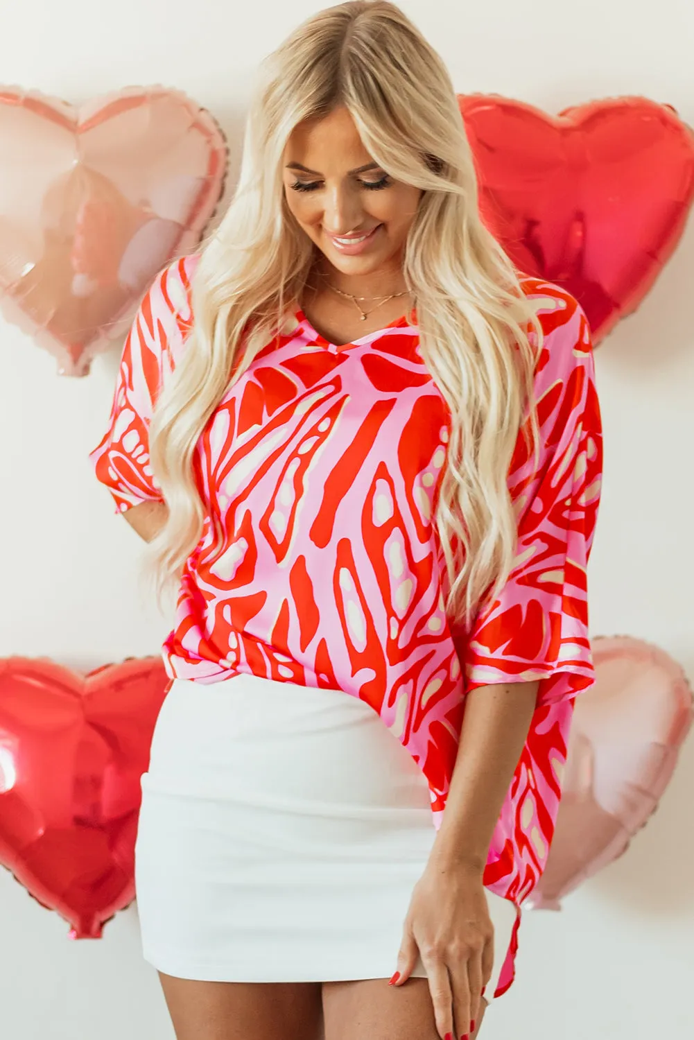 Red Abstract Print V Neck Batwing Sleeve Oversized Blouse sold by Beagle Boutique product image thumbnail 4