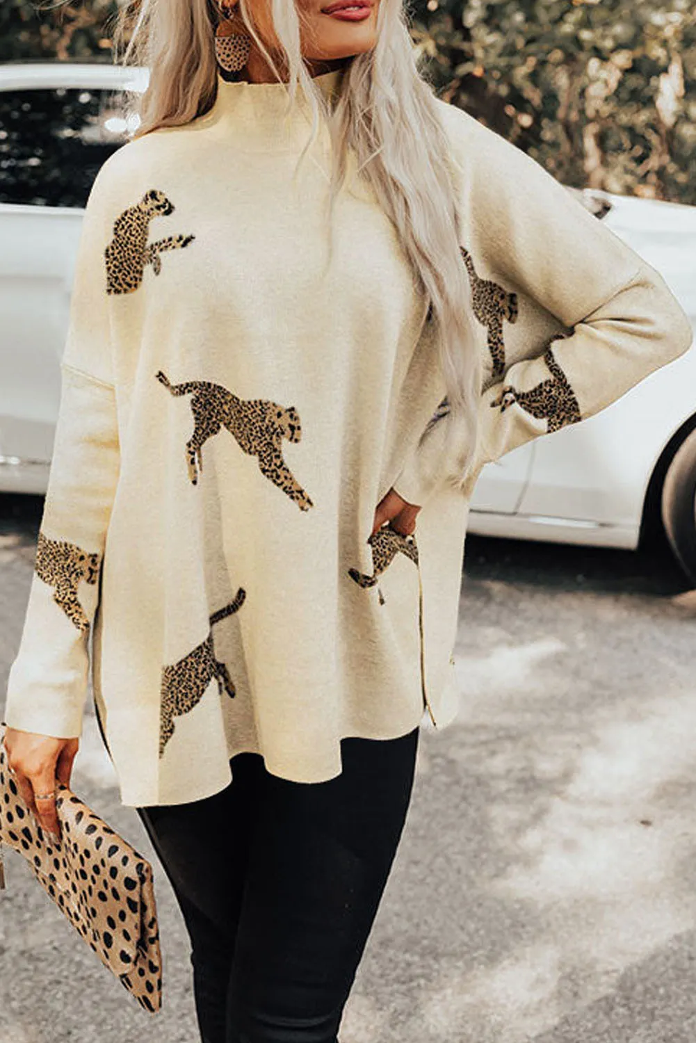Parchment Lively Cheetah Print High Neck Split Hem Sweater sold by Beagle Boutique