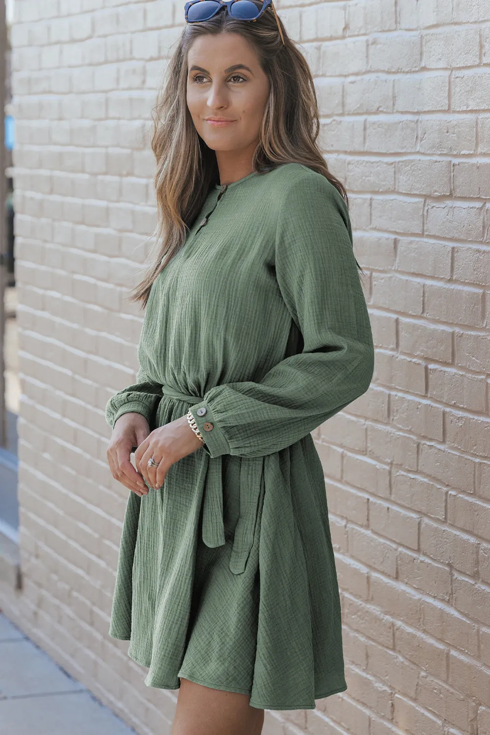 Jungle Green Button Neck Puff Sleeve Belted Pleated Mini Dress sold by Beagle Boutique product image thumbnail 3