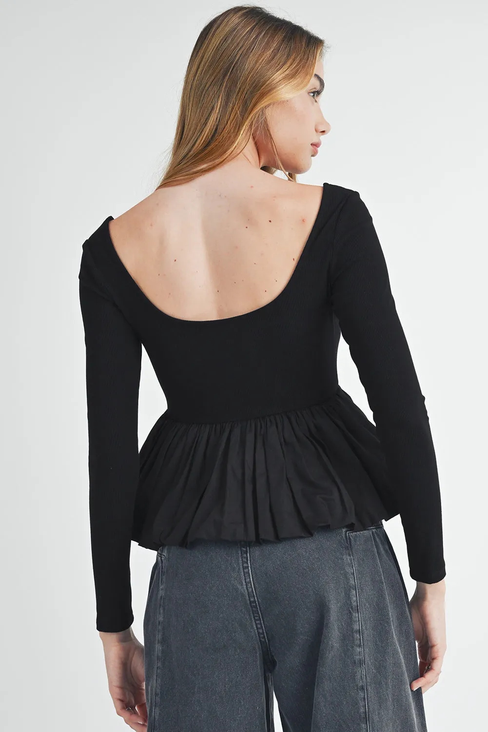 Black Ribbed Knit Long Sleeve Scoop Neck Peplum Patchwork Top sold by Beagle Boutique product image thumbnail 2
