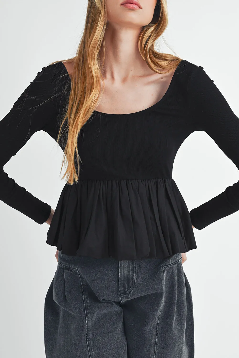 Black Ribbed Knit Long Sleeve Scoop Neck Peplum Patchwork Top sold by Beagle Boutique